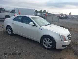 ✅ 2009 Cadillac CTS RWD • VIN: 1G6DF577490152024 • Лот: 43390838. Опубликован ранее на IAAI с пробегом 102 666 миль. Бесплатный доступ к архиву аукционных продаж из США и подробный отчёт об истории автомобиля на DreamBid. Изображение 1.