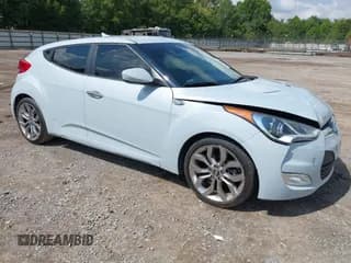 ✅ 2015 Hyundai Veloster • VIN: KMHTC6AD6FU222077 • Lot: 42913230. Listed on IAAI with 120,652 mi. Free auction sales archive from the USA and detailed vehicle history report at DreamBid. Image 1.