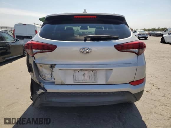 2018 Hyundai Tucson SEL with VIN KM8J33A49JU696698, listed as a Copart auction lot 81082295 with 100,669 mi miles and Salvage title. Bid and sale history available at DreamBid. Image 6.