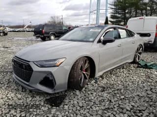 ✅ 2021 Audi RS 7 • VIN: WUAPCBF26MN906501 • Lot: 37039103. Wystawiony na Copart z przebiegiem Nie podano. Bezpłatny archiwum sprzedaży aukcyjnych z USA i szczegółowy raport historii pojazdu na DreamBid. Zdjęcie 1.