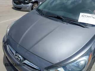 2014 Hyundai Accent GS with VIN KMHCT5AE9EU190260, listed as a IAAI auction lot 42739776 with 149,945 mi miles and . Bid and sale history available at DreamBid. Image 6.