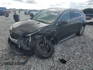 ✅ 2020 Cadillac XT4 FWD Premium Luxury • VIN: 1GYFZCR42LF044066 • Лот: 87080925. Опубликован ранее на Copart с пробегом 151 033 миль. Бесплатный доступ к архиву аукционных продаж из США и подробный отчёт об истории автомобиля на DreamBid. Изображение 1.