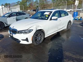 ✅ 2022 BMW 3 Series 330i xDrive • VIN: 3MW5R7J00N8C65787 • Lot: 43790437. Listed on IAAI with 21,124 mi. Free auction sales archive from the USA and detailed vehicle history report at DreamBid. Image 2.