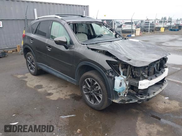 ✅ 2016 Mazda CX-5 Grand Touring • VIN: JM3KE4DY2G0763608 • Lot: 43864275. Wystawiony na IAAI z przebiegiem 95 452 mil. Bezpłatny archiwum sprzedaży aukcyjnych z USA i szczegółowy raport historii pojazdu na DreamBid. Zdjęcie 1.