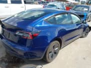 ✅ 2023 Tesla Model 3 • VIN: 5YJ3E1EA8PF403743 • Lot: 42076747. Listed on IAAI with 58,399 mi. Free auction sales archive from the USA and detailed vehicle history report at DreamBid. Image 4.
