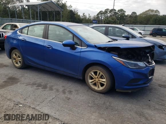 ✅ 2018 Chevrolet Cruze LT • VIN: 1G1BE5SM7J7211883 • Lot: 70866072. Listed on Copart with 190,458 mi. Free auction sales archive from the USA and detailed vehicle history report at DreamBid. Image 4.