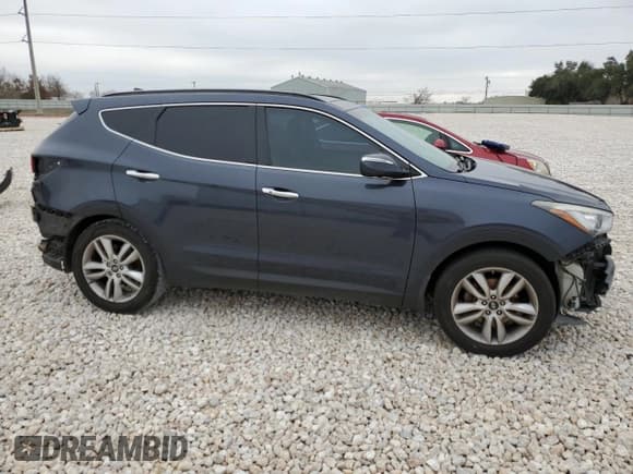 ✅ 2015 Hyundai Santa Fe • VIN: 5XYZW4LA9FG247358 • Лот: 80097673. Опубликован ранее на Copart с пробегом Не указан. Бесплатный доступ к архиву аукционных продаж из США и подробный отчёт об истории автомобиля на DreamBid. Изображение 4.