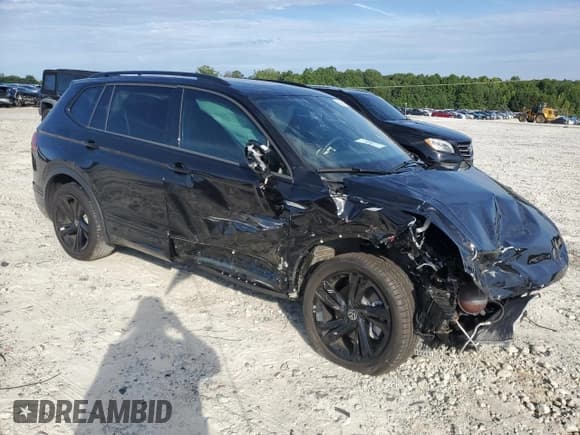 ✅ 2024 Volkswagen Tiguan SE R-Line Black • VIN: 3VVCB7AX4RM194068 • Лот: 69991685. Опубликован ранее на Copart с пробегом 7 717 миль. Бесплатный доступ к архиву аукционных продаж из США и подробный отчёт об истории автомобиля на DreamBid. Изображение 4.