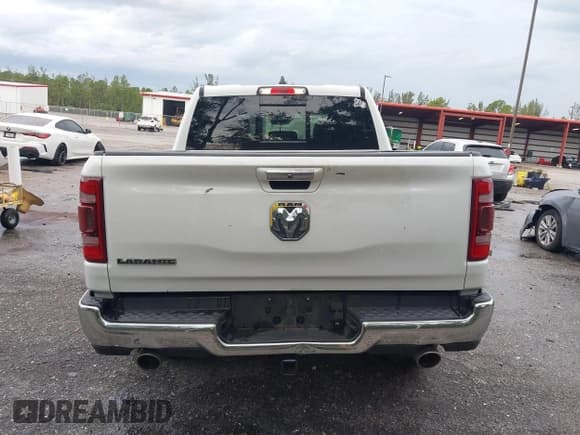 ✅ 2021 Ram 1500 Laramie • VIN: 1C6RREJT5MN628655 • Lot: 42734346. Listed on IAAI with 104,116 mi. Free auction sales archive from the USA and detailed vehicle history report at DreamBid. Image 16.