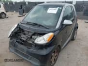 ✅ 2013 Smart fortwo Pure • VIN: WMEEJ3BA5DK620493 • Лот: 42071086. Опубликован ранее на IAAI с пробегом 85 883 миль. Бесплатный доступ к архиву аукционных продаж из США и подробный отчёт об истории автомобиля на DreamBid. Изображение 2.