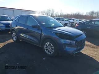 ✅ 2020 Ford Escape SE • VIN: 1FMCU9G60LUB54720 • Lot: 43756204. Listed on IAAI with 87,877 mi. Free auction sales archive from the USA and detailed vehicle history report at DreamBid. Image 1.