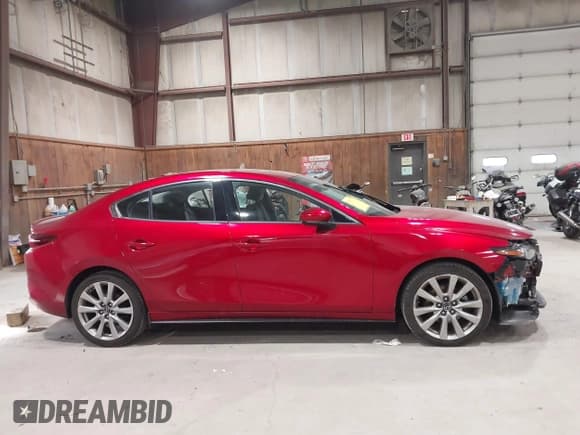 ✅ 2021 Mazda 3 • VIN: JM1BPBDL0M1334811 • Lot: 43777630. Listed on IAAI with 57,584 mi. Free auction sales archive from the USA and detailed vehicle history report at DreamBid. Image 14.