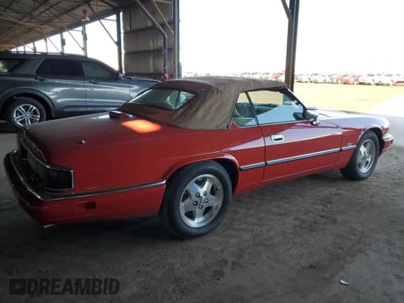 ✅ 1995 Jaguar XJS • VIN: SAJNX2749SC196416 • Lot: 49914445. Listed on Copart with 157,907 mi. Free auction sales archive from the USA and detailed vehicle history report at DreamBid. Image 3.