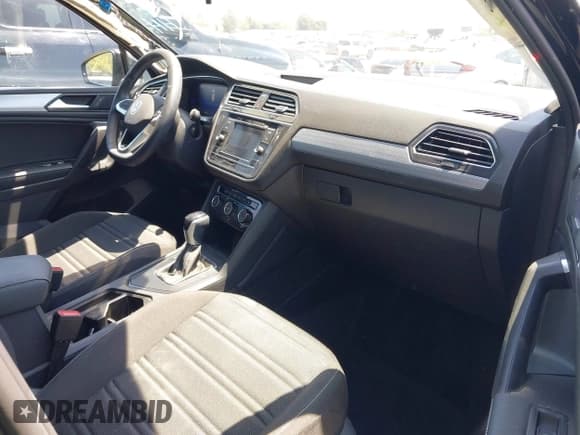 ✅ 2023 Volkswagen Tiguan S • VIN: 3VVRB7AX3PM064709 • Lot: 42103656. Listed on IAAI with 17,157 mi. Free auction sales archive from the USA and detailed vehicle history report at DreamBid. Image 5.