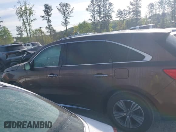 ✅ 2019 Acura MDX • VIN: 5J8YD3H33KL002920 • Lot: 41996777. Listed on IAAI with 129,410 mi. Free auction sales archive from the USA and detailed vehicle history report at DreamBid. Image 14.