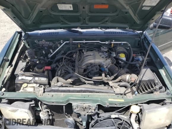 ✅ 2000 Nissan Xterra XE • VIN: 5N1ED28Y3YC510994 • Lot: 63338745. Wystawiony na Copart z przebiegiem 215 796 mil. Bezpłatny archiwum sprzedaży aukcyjnych z USA i szczegółowy raport historii pojazdu na DreamBid. Zdjęcie 12.