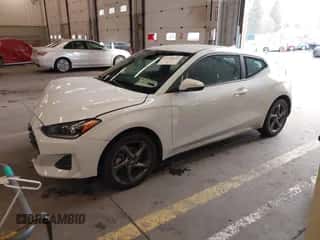 2019 Hyundai Veloster Premium z VIN KMHTG6AF7KU019571, wystawiony jako IAAI lot #41478431 z przebiegiem 107 197 mil mil oraz . Historia ofert i sprzedaży dostępna na DreamBid. Obrazek 2.
