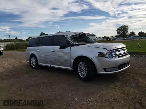 ✅ 2015 Ford Flex SEL • VIN: 2FMGK5C82FBA19515 • Lot: 71609565. Listed on Copart with 135,824 mi. Free auction sales archive from the USA and detailed vehicle history report at DreamBid. Image 13.