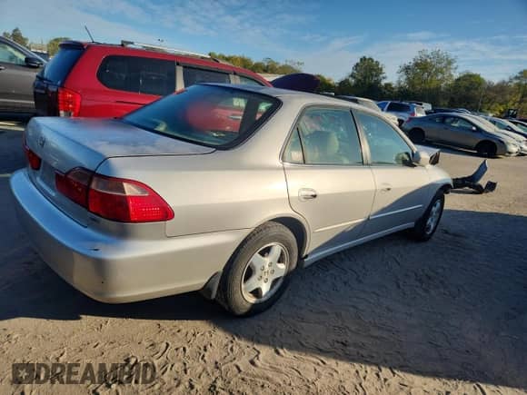 1999 Honda Accord EX with VIN 1HGCG1650XA047648, listed as a Copart auction lot 85530585 with Not provided miles and Salvage title. Bid and sale history available at DreamBid. Image 3.