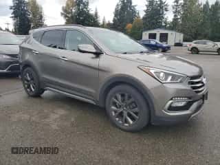 2017 Hyundai Santa Fe Ultimate z VIN 5XYZWDLA3HG485502, wystawiony jako Copart lot #90261245 z przebiegiem 84 872 mil mil oraz Szkoda całkowita • Salvage title. Historia ofert i sprzedaży dostępna na DreamBid. Obrazek 4.