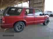 1995 Chevrolet Blazer z VIN 1GNCS13W8S2238495, wystawiony jako Copart lot #74829034 z przebiegiem 199 884 mil mil oraz Szkoda całkowita • Salvage title. Historia ofert i sprzedaży dostępna na DreamBid. Obrazek 3.