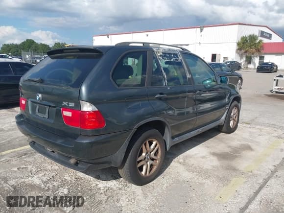 ✅ 2004 BMW X5 3.0i • VIN: 5UXFA13504LU40159 • Lot: 43231692. Listed on IAAI with 113,261 mi. Free auction sales archive from the USA and detailed vehicle history report at DreamBid. Image 4.