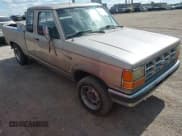 ✅ 1990 Ford Ranger • VIN: 1FTCR15T6LPA19076 • Lot: 43020677. Listed on IAAI with 20,353 mi. Free auction sales archive from the USA and detailed vehicle history report at DreamBid. Image 1.