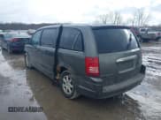 ✅ 2010 Chrysler Town & Country LX • VIN: 2A4RR2D16AR387179 • Lot: 41410509. Wystawiony na IAAI z przebiegiem 209 506 mil. Bezpłatny archiwum sprzedaży aukcyjnych z USA i szczegółowy raport historii pojazdu na DreamBid. Zdjęcie 3.