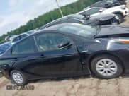 ✅ 2022 Toyota Prius L Eco • VIN: JTDKAMFU8N3181135 • Lot: 42098611. Listed on IAAI with 69,949 mi. Free auction sales archive from the USA and detailed vehicle history report at DreamBid. Image 13.