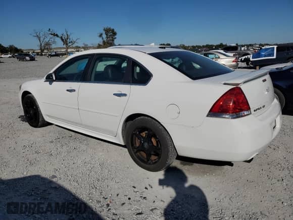 ✅ 2013 Chevrolet Impala LTZ • VIN: 2G1WC5E38D1215761 • Lot: 90534035. Listed on Copart with 205,467 mi. Free auction sales archive from the USA and detailed vehicle history report at DreamBid. Image 2.