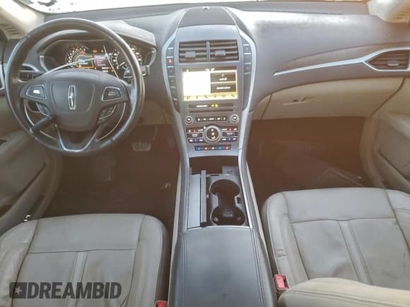 ✅ 2017 Lincoln MKZ Reserve • VIN: 3LN6L5F92HR602197 • Lot: 94865225. Wystawiony na Copart z przebiegiem 63 805 mil. Bezpłatny archiwum sprzedaży aukcyjnych z USA i szczegółowy raport historii pojazdu na DreamBid. Zdjęcie 8.