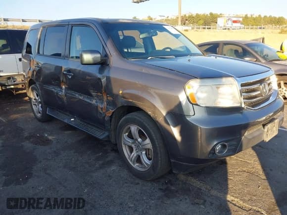 ✅ 2013 Honda Pilot EX-L • VIN: 5FNYF3H77DB038563 • Lot: 41442289. Listed on IAAI with 136,250 mi. Free auction sales archive from the USA and detailed vehicle history report at DreamBid. Image 1.