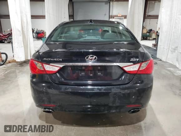 2013 Hyundai Sonata SE z VIN 5NPEC4AB9DH805489, wystawiony jako Copart lot #71930615 z przebiegiem 112 389 mil mil oraz Szkoda całkowita • Salvage title. Historia ofert i sprzedaży dostępna na DreamBid. Obrazek 6.