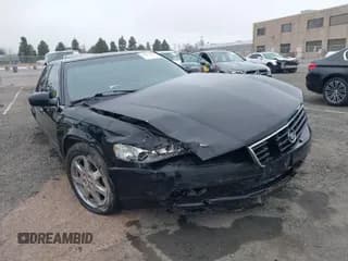 ✅ 2002 Cadillac Seville Touring STS • VIN: 1G6KY54982U239673 • Lot: 41657709. Wystawiony na IAAI z przebiegiem 92 224 mil. Bezpłatny archiwum sprzedaży aukcyjnych z USA i szczegółowy raport historii pojazdu na DreamBid. Zdjęcie 1.