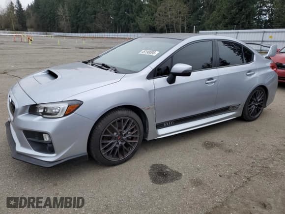✅ 2015 Subaru WRX STI • VIN: JF1VA2L62F9801585 • Лот: 45190095. Опубликован ранее на Copart с пробегом 48 546 миль. Бесплатный доступ к архиву аукционных продаж из США и подробный отчёт об истории автомобиля на DreamBid. Изображение 1.