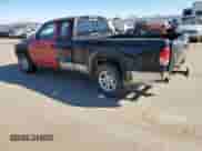 2003 Dodge Dakota SLT z VIN 1D7HL42X33S284170, wystawiony jako Copart lot #76657204 z przebiegiem 146 790 mil mil oraz Szkoda całkowita • Salvage title. Historia ofert i sprzedaży dostępna na DreamBid. Obrazek 2.