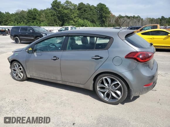 ✅ 2015 Kia Forte SX • VIN: KNAFZ5A37F5265187 • Lot: 71542025. Listed on Copart with 128,894 mi. Free auction sales archive from the USA and detailed vehicle history report at DreamBid. Image 2.