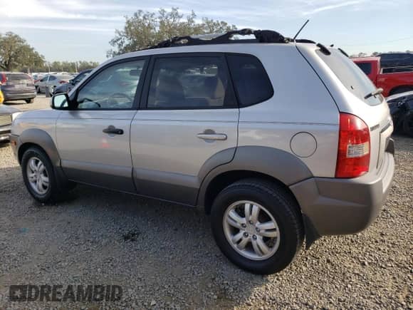 2006 Hyundai Tucson GLS z VIN KM8JN12D46U349221, wystawiony jako Copart lot #83877214 z przebiegiem 96 268 mil mil oraz Szkoda całkowita • Salvage title. Historia ofert i sprzedaży dostępna na DreamBid. Obrazek 2.