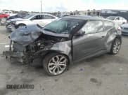 ✅ 2013 Hyundai Veloster w/Black Int • VIN: KMHTC6AD2DU132826 • Lot: 41238320. Wystawiony na IAAI z przebiegiem Nie podano. Bezpłatny archiwum sprzedaży aukcyjnych z USA i szczegółowy raport historii pojazdu na DreamBid. Zdjęcie 2.