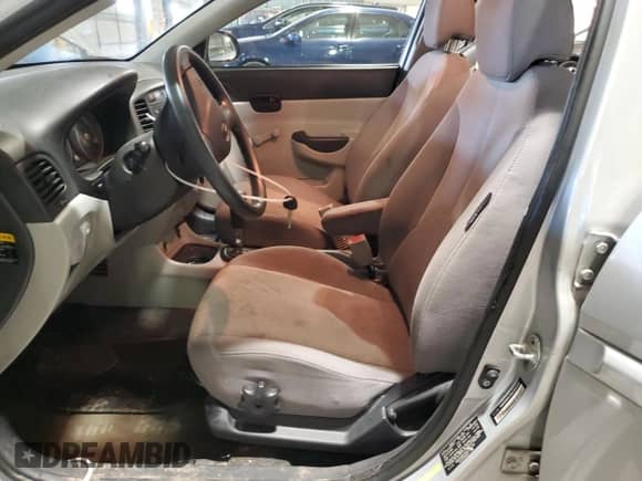 2009 Hyundai Accent Auto GLS z VIN KMHCN46C99U306008, wystawiony jako Copart lot #74152544 z przebiegiem 124 576 mil mil oraz Szkoda całkowita • Salvage title. Historia ofert i sprzedaży dostępna na DreamBid. Obrazek 7.