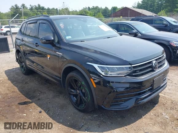 ✅ 2023 Volkswagen Tiguan SE R-Line Black • VIN: 3VV8B7AX4PM069560 • Лот: 42621790. Опубликован ранее на IAAI с пробегом 10 676 миль. Бесплатный доступ к архиву аукционных продаж из США и подробный отчёт об истории автомобиля на DreamBid. Изображение 1.