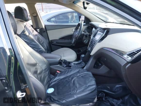 2017 Hyundai Santa Fe 2.4L z VIN 5NMZU3LBXHH012582, wystawiony jako IAAI lot #43513858 z przebiegiem 139 498 mil mil oraz . Historia ofert i sprzedaży dostępna na DreamBid. Obrazek 5.