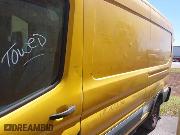 ✅ 2015 Ford Transit Cargo • VIN: 1FTNR2CM3FKA74886 • Lot: 41816951. Listed on IAAI with 134,520 mi. Free auction sales archive from the USA and detailed vehicle history report at DreamBid. Image 14.