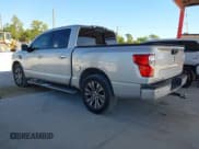 ✅ 2017 Nissan Titan Platinum Reserve • VIN: 1N6AA1E68HN542396 • Lot: 43688877. Listed on IAAI with 124,644 mi. Free auction sales archive from the USA and detailed vehicle history report at DreamBid. Image 3.