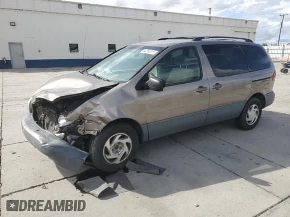 ✅ 1999 Toyota Sienna LE • VIN: 4T3ZF13C2XU134628 • Лот: 84294315. Опубликован ранее на Copart с пробегом 211 607 миль. Бесплатный доступ к архиву аукционных продаж из США и подробный отчёт об истории автомобиля на DreamBid. Изображение 1.