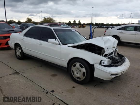 ✅ 1995 Acura Legend L • VIN: JH4KA7663SC007776 • Lot: 79210664. Listed on Copart with 142,872 mi. Free auction sales archive from the USA and detailed vehicle history report at DreamBid. Image 4.