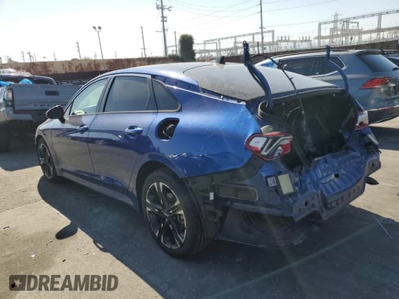 ✅ 2022 Kia K5 GT-Line • VIN: 5XXG64J26NG093181 • Лот: 82770625. Опубликован ранее на Copart с пробегом 65 501 миль. Бесплатный доступ к архиву аукционных продаж из США и подробный отчёт об истории автомобиля на DreamBid. Изображение 2.