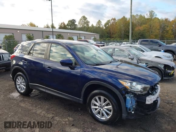 ✅ 2014 Mazda CX-5 Touring • VIN: JM3KE2CY8E0370523 • Lot: 43547270. Listed on IAAI with 111,517 mi. Free auction sales archive from the USA and detailed vehicle history report at DreamBid. Image 1.