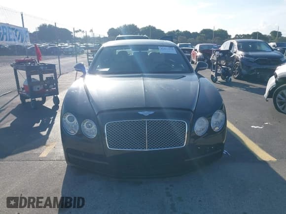 ✅ 2015 Bentley Flying Spur V8 • VIN: SCBET9ZA2FC041866 • Лот: 42477350. Опубликован ранее на IAAI с пробегом 69 276 миль. Бесплатный доступ к архиву аукционных продаж из США и подробный отчёт об истории автомобиля на DreamBid. Изображение 6.