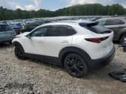 ✅ 2023 Mazda CX-30 Premium • VIN: 3MVDMBDY6PM501160 • Лот: 66601135. Опубликован ранее на Copart с пробегом 28 784 миль. Бесплатный доступ к архиву аукционных продаж из США и подробный отчёт об истории автомобиля на DreamBid. Изображение 2.